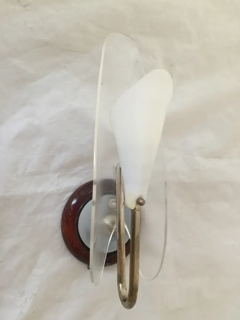 Antique pair of sconces featuring soft light and curved design with opaline glass.