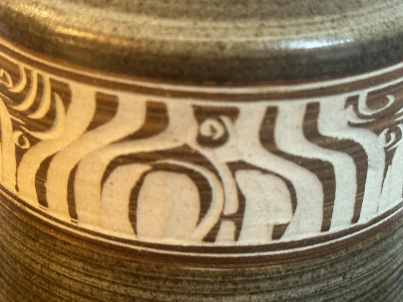 Ancient ceramic with unique handcrafted decorations.