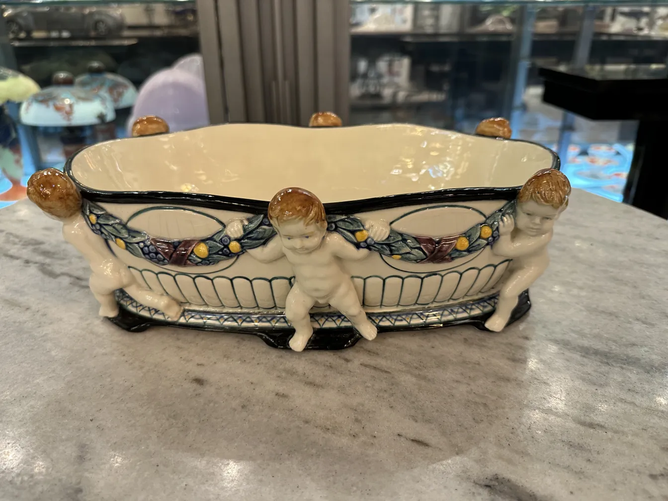 Antique decorative ceramic with children, colorful edge