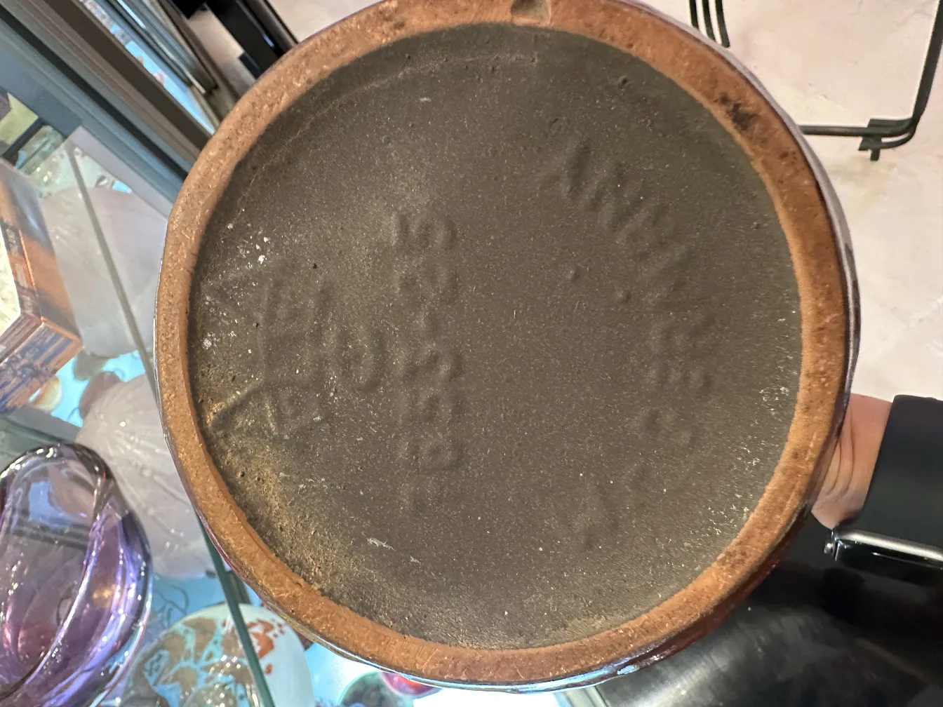 Top view of an antique ceramic with visible markings.