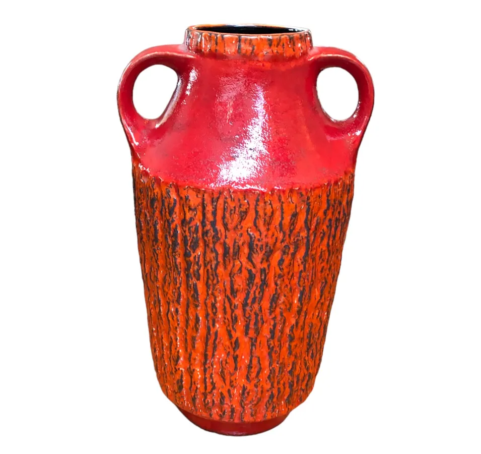 Antique textured red ceramic vase with distinctive shape