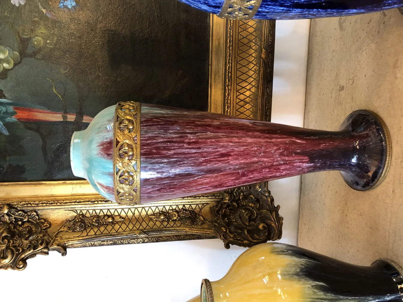 Antique decorative ceramic vase with vibrant colors and gold details