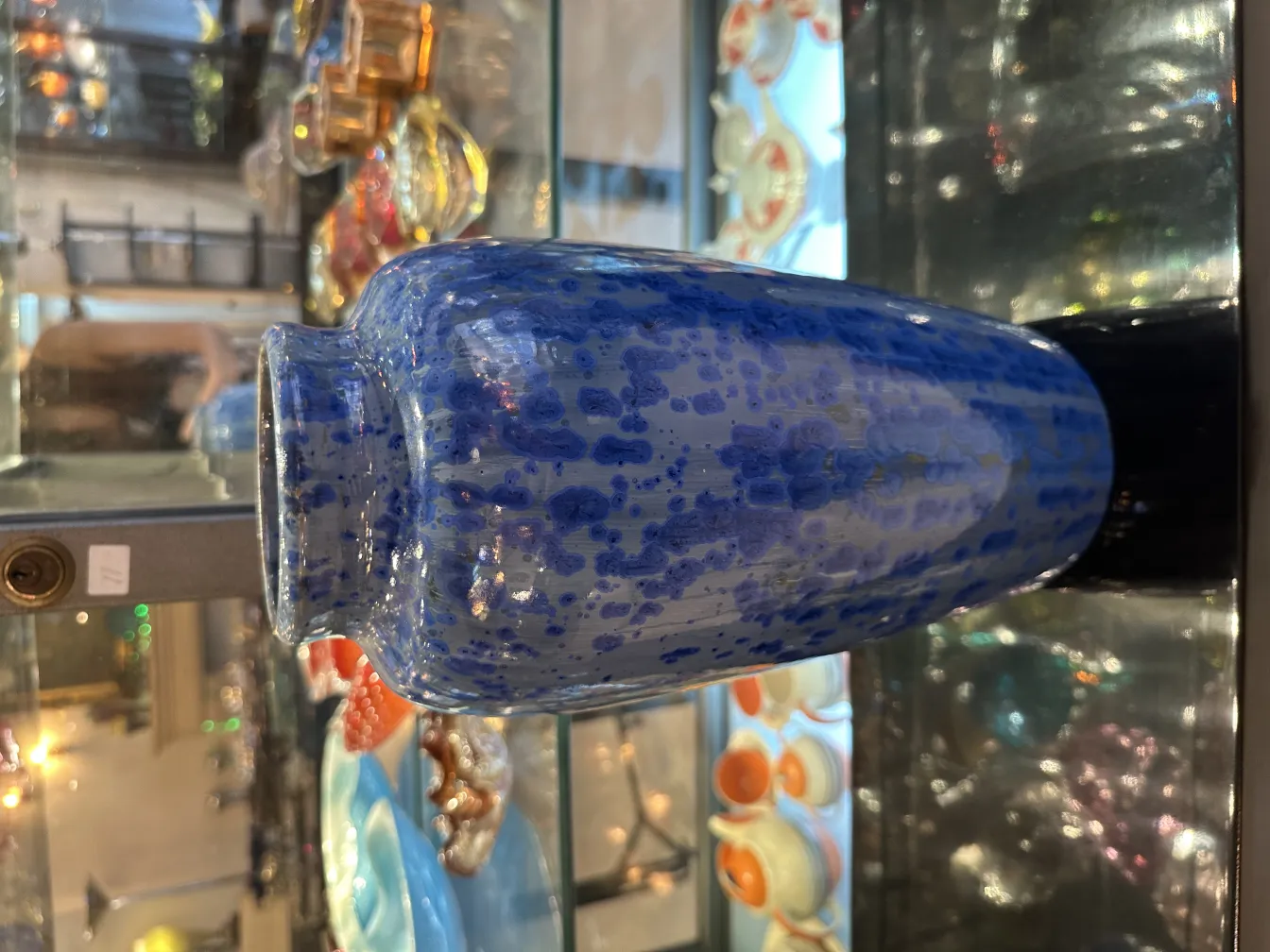 Antique ceramic vase, blue color, featuring visible details