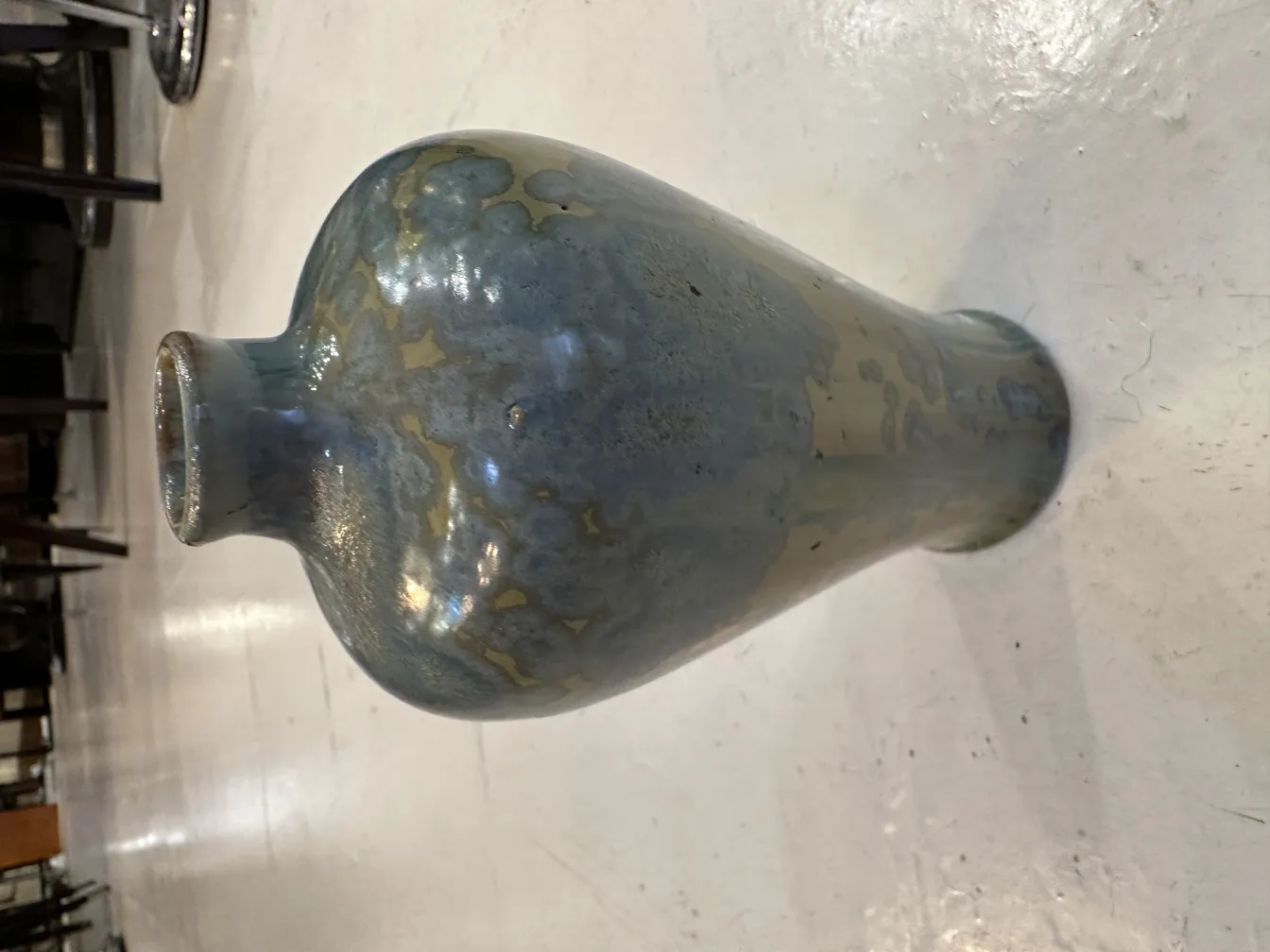 Antique decorative ceramic with blue finish.