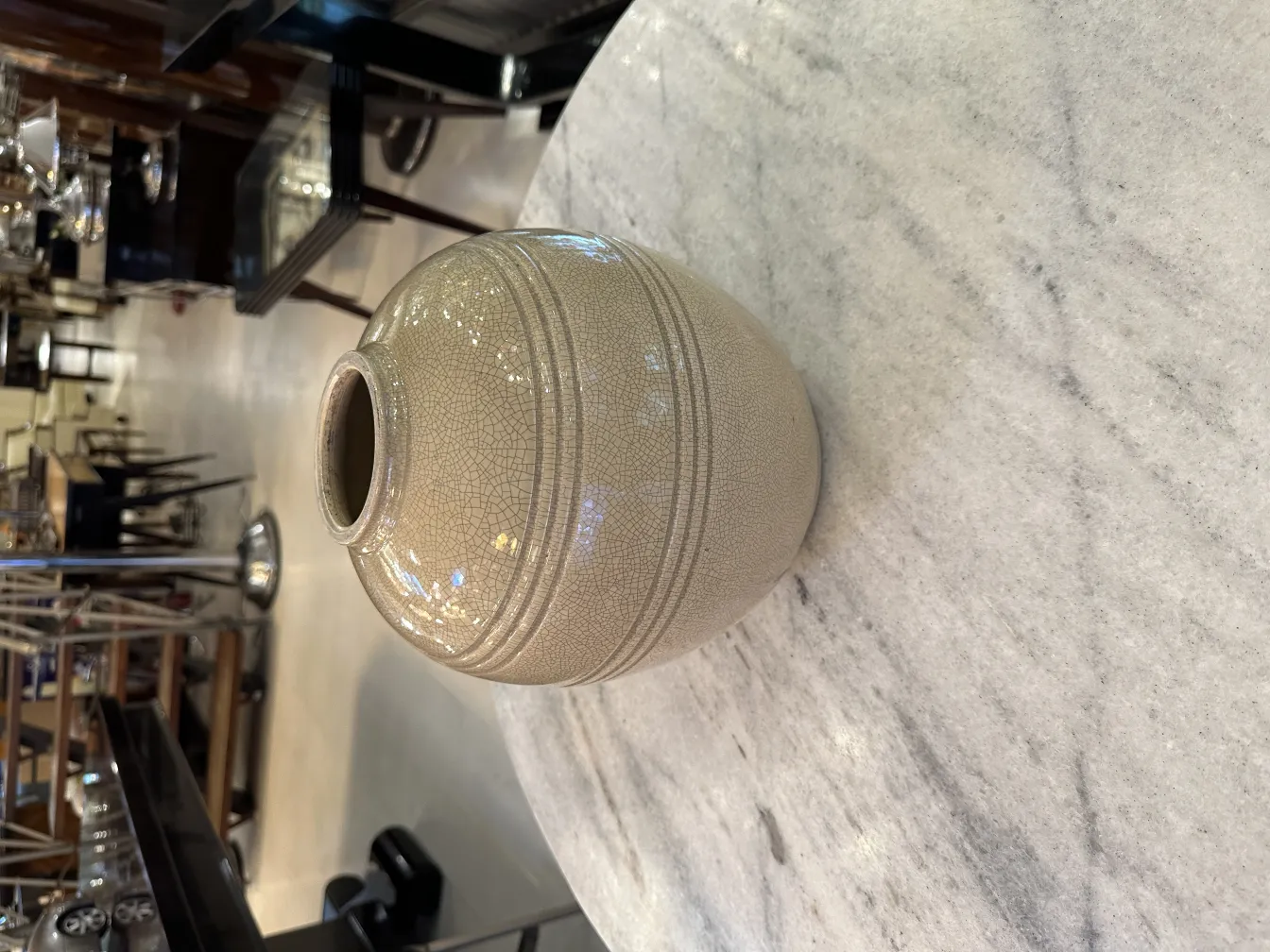 Antique ceramic vase on marble table