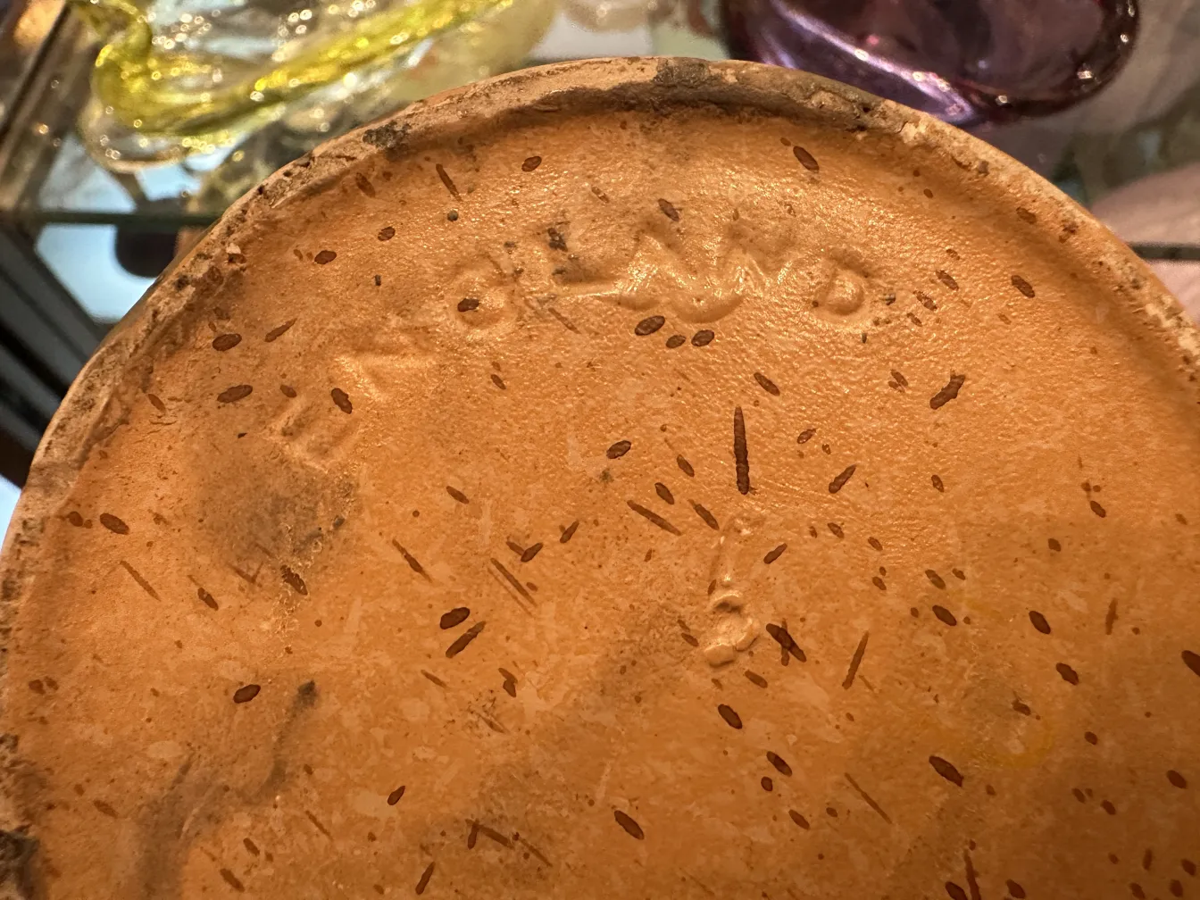 Antique ceramic base with interesting texture and varied setting.