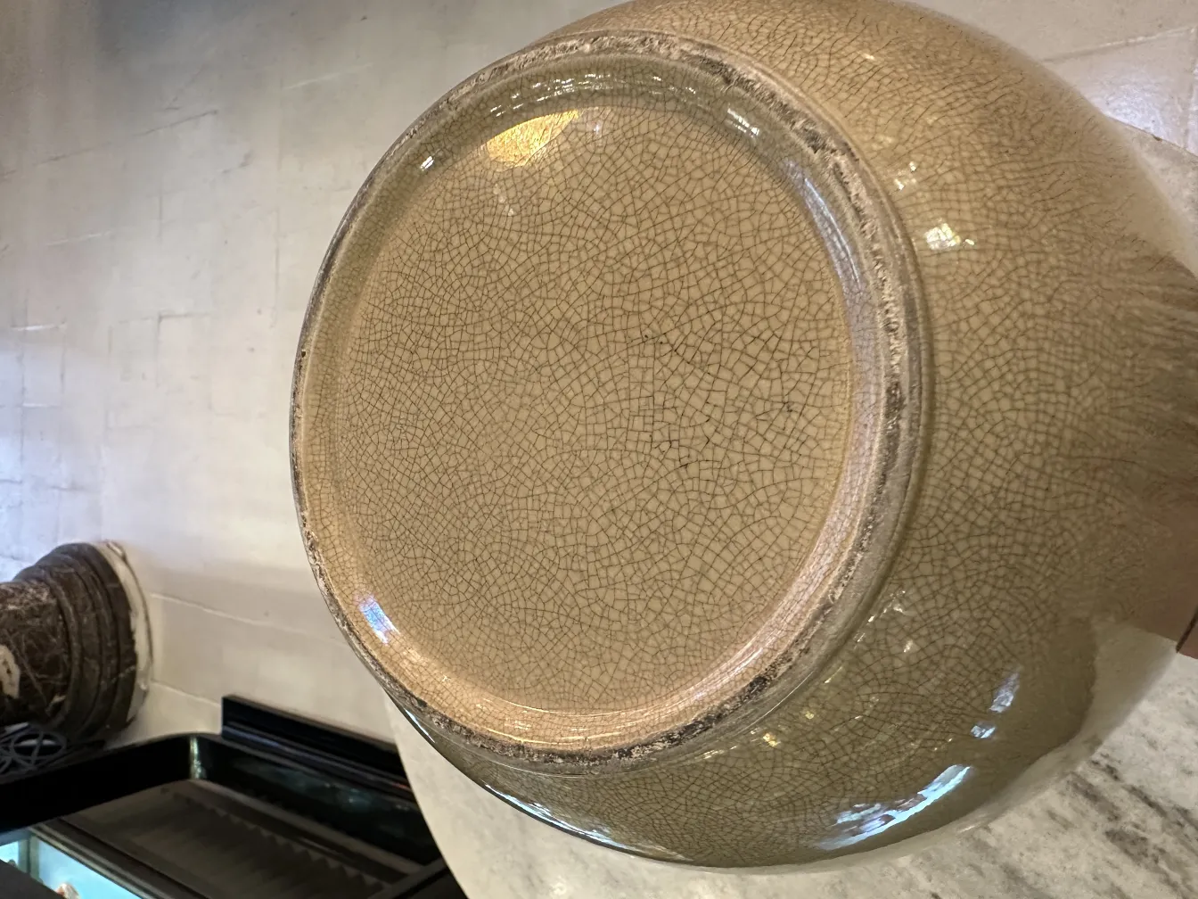 Antique ceramic bowl with a clear crackled design.