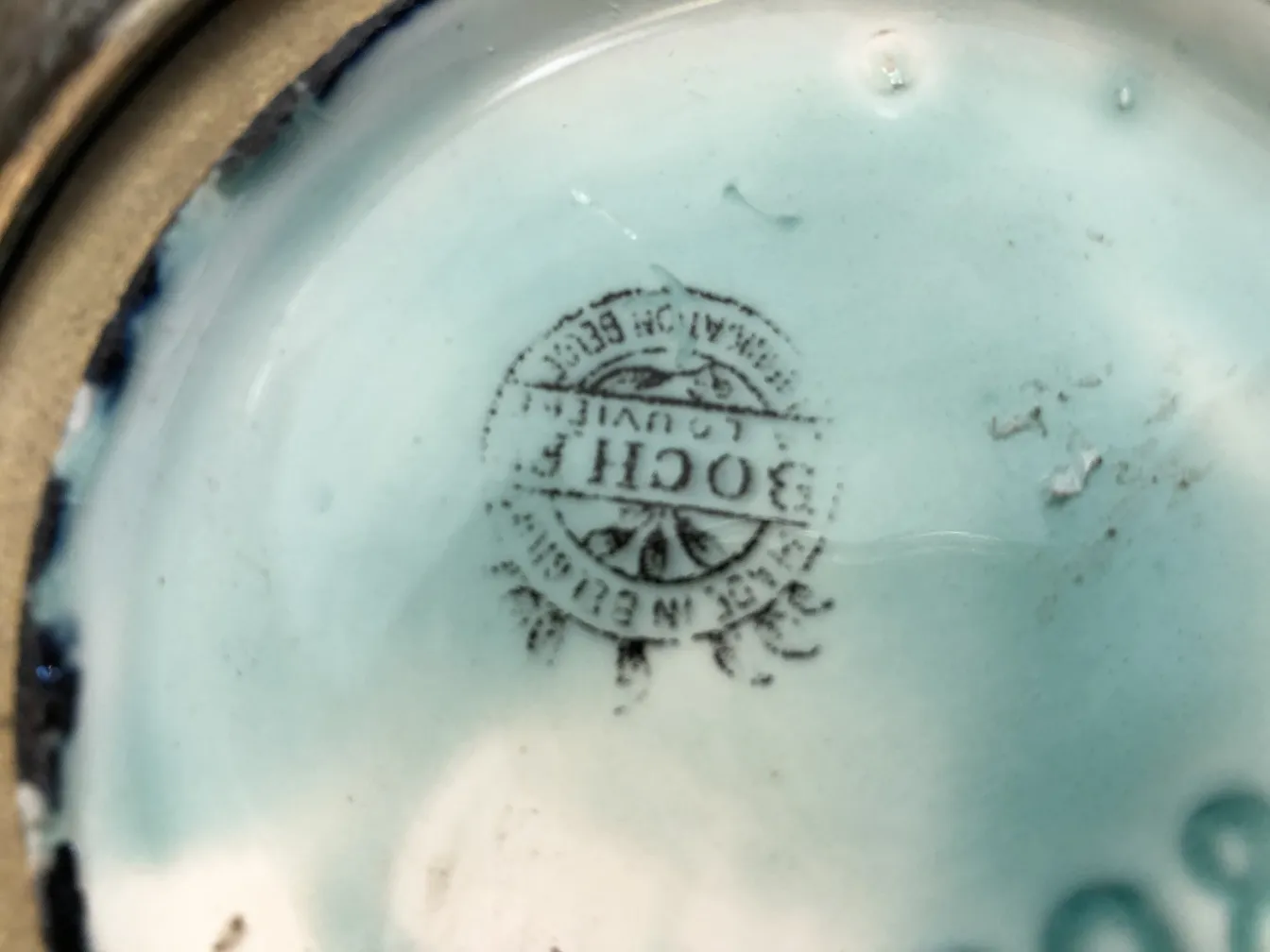 Antique ceramic with Boguch seal, light blue color and details.