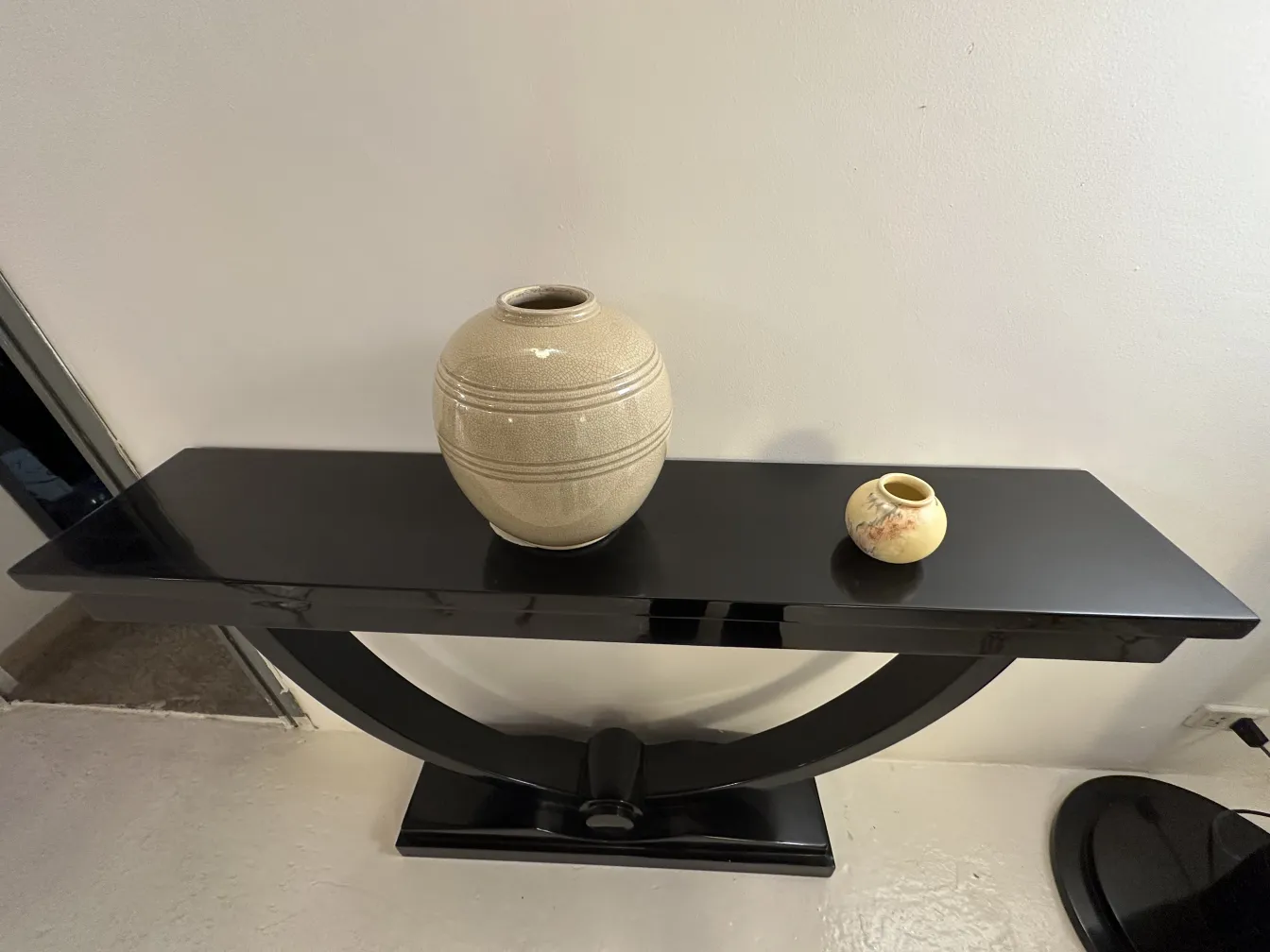 Antique ceramic vases on modern black table