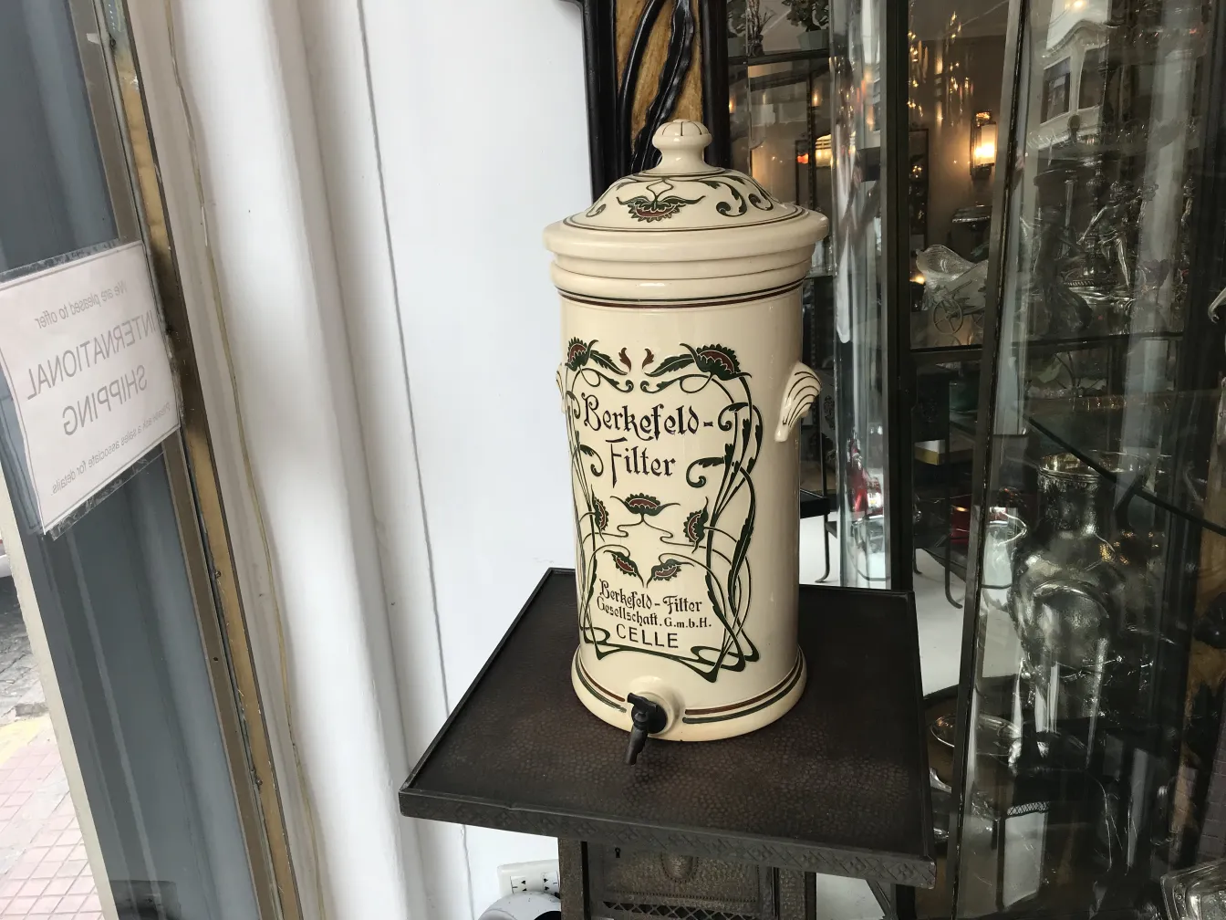 Antique Berkefeld ceramic with green details, classic style.