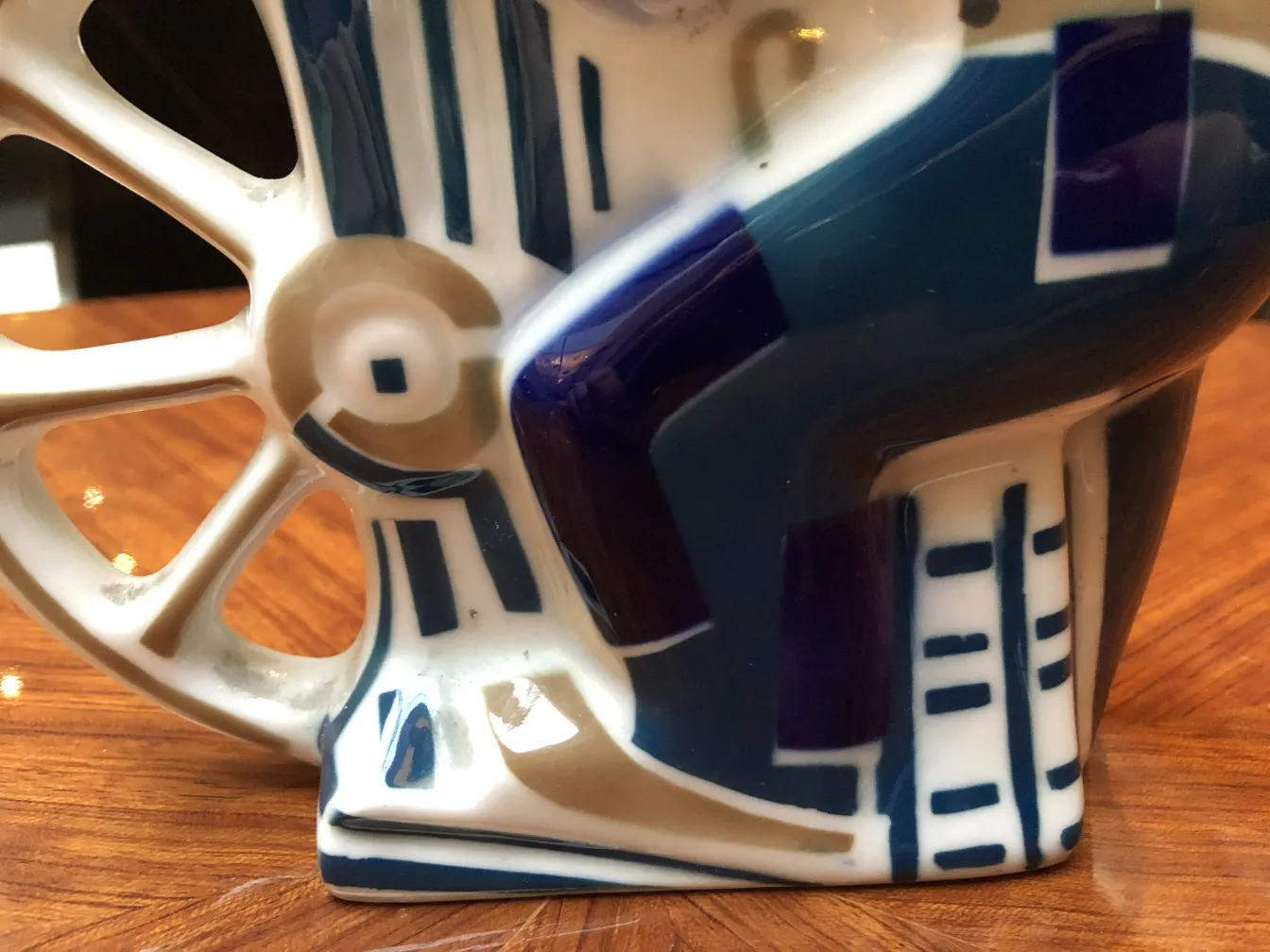 Antique ceramic jug with blue and white pattern