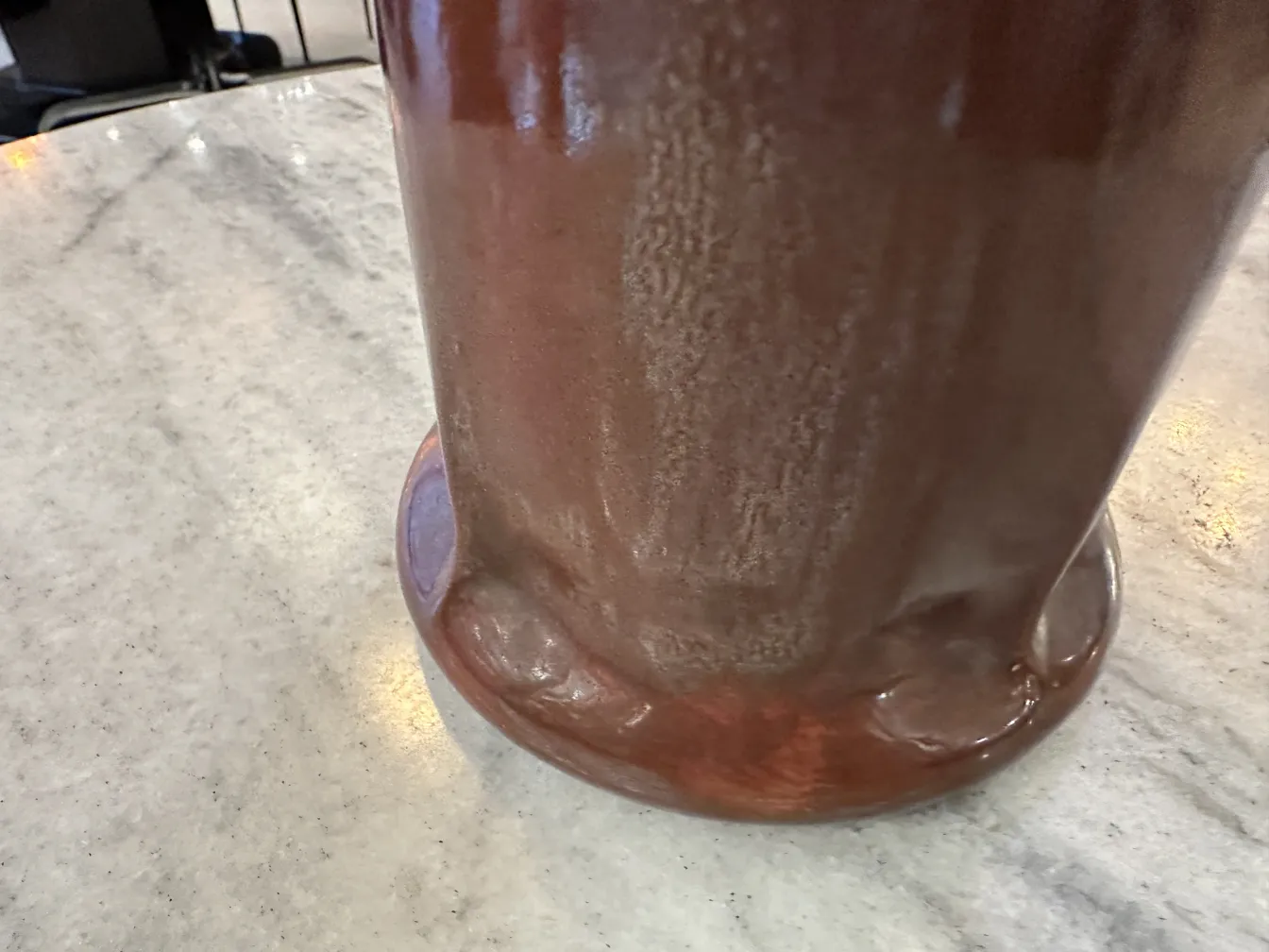 Antique cylindrical ceramic with glossy surface and base