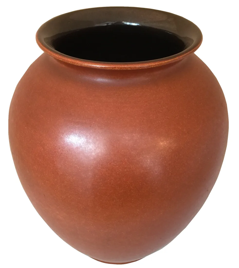 Antique ceramic brown vase with black rim.