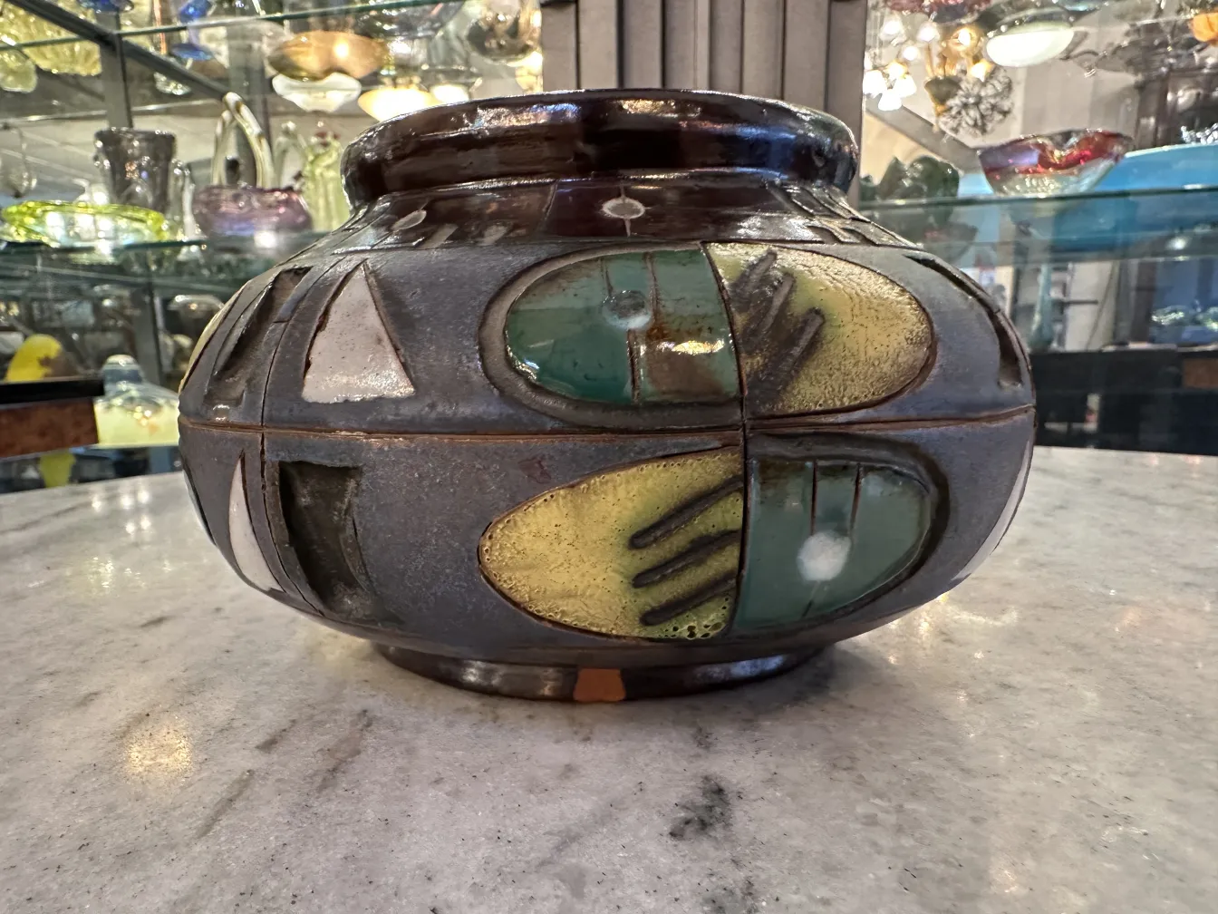 Antique ceramic vase with colorful decoration and artistic patterns