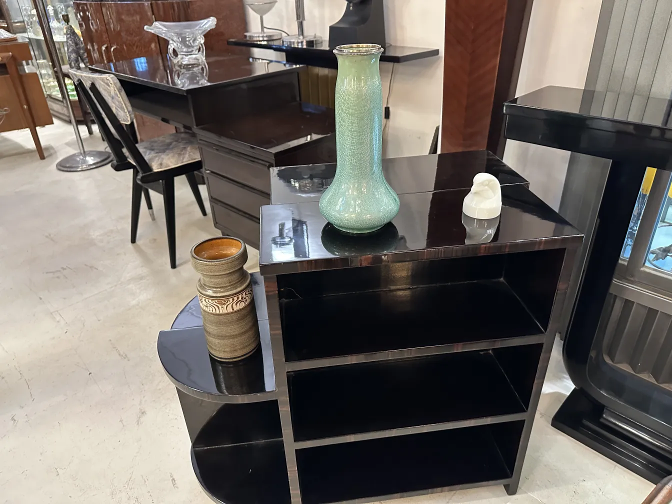 Antique ceramic vase in green color amidst a stylish setting