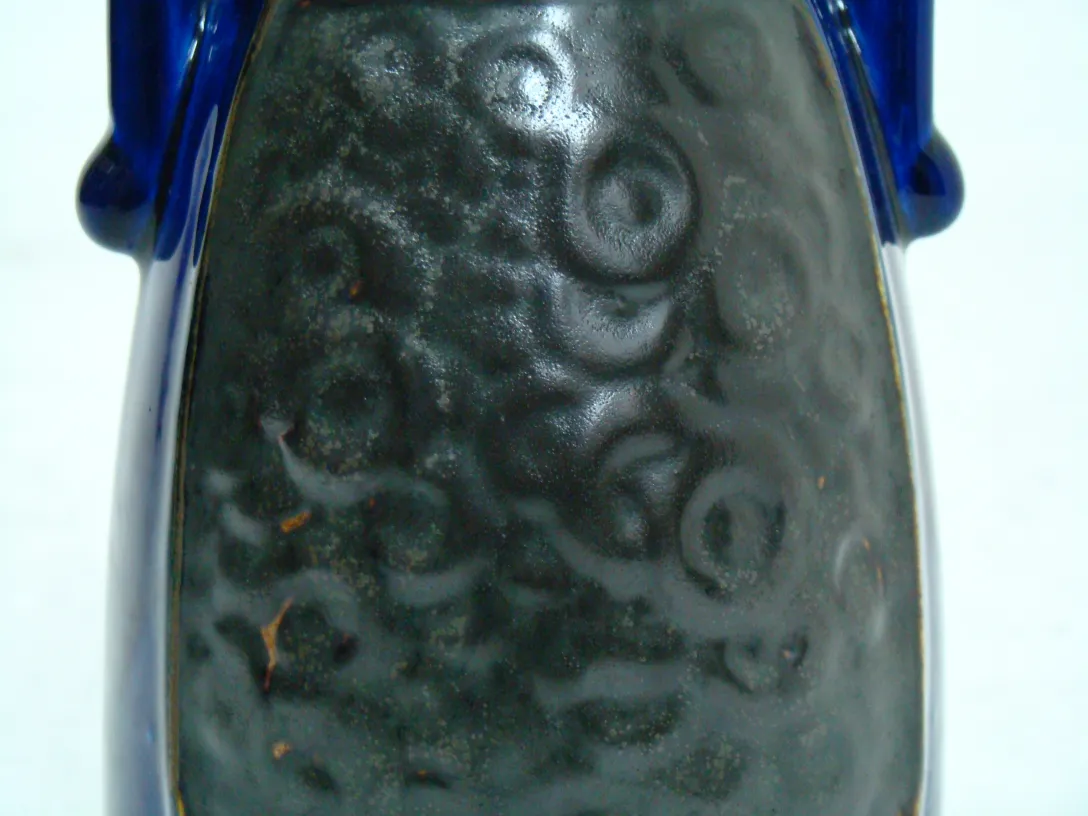 Antique ceramic spherical decoration with relief design