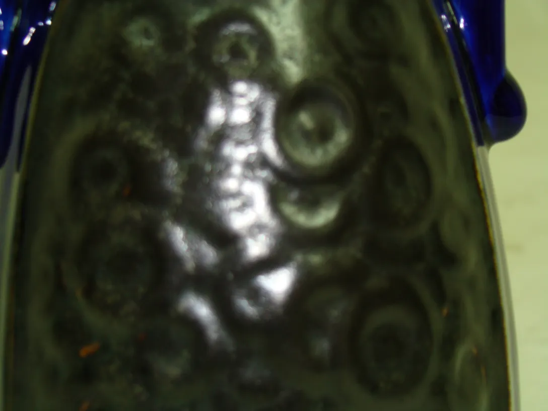 antique ceramic vase with circular texture