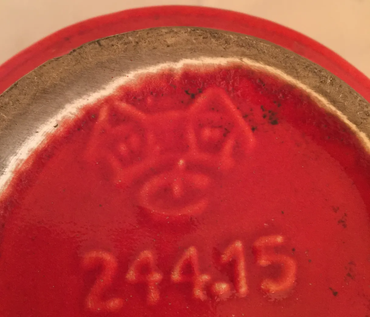 Antique red ceramic with artisan details