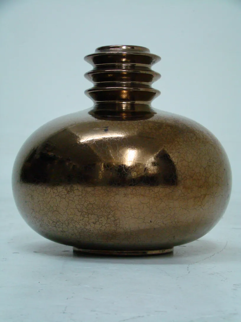 decorative vase in brown tones with an oval shape