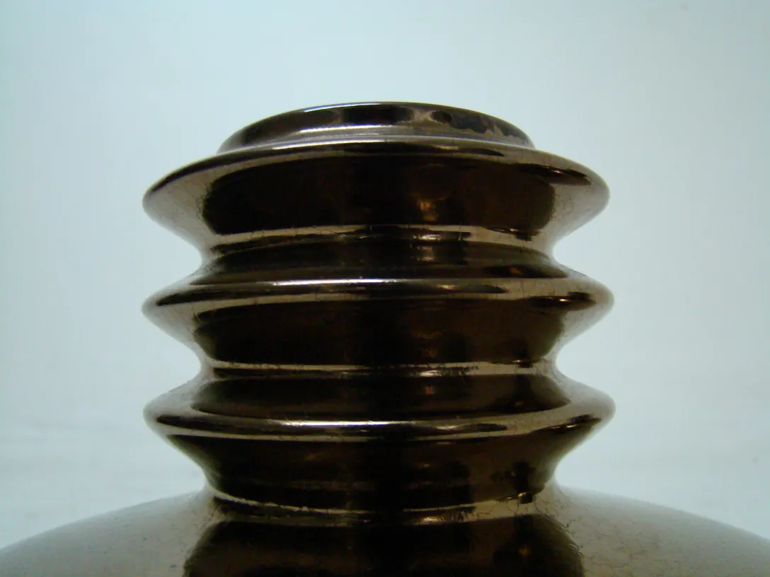 Detail of an antique decorative ceramic with wavy shapes