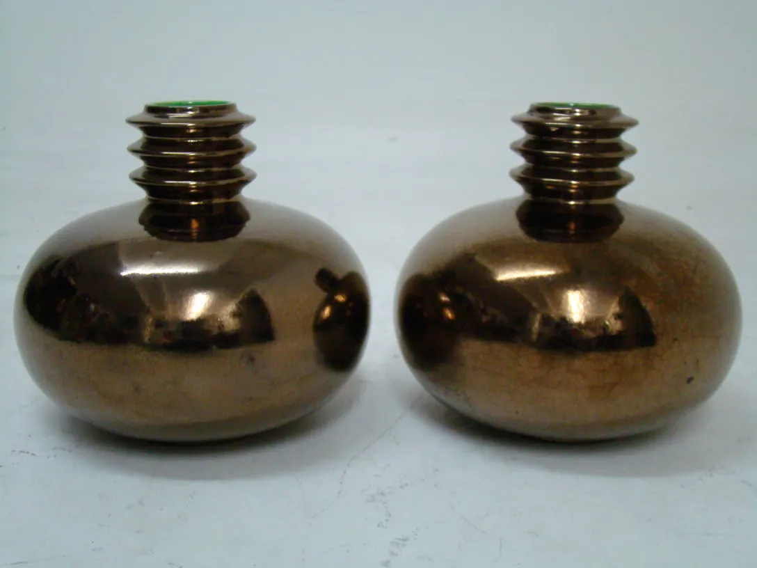 two antique brown decorative ceramic vases
