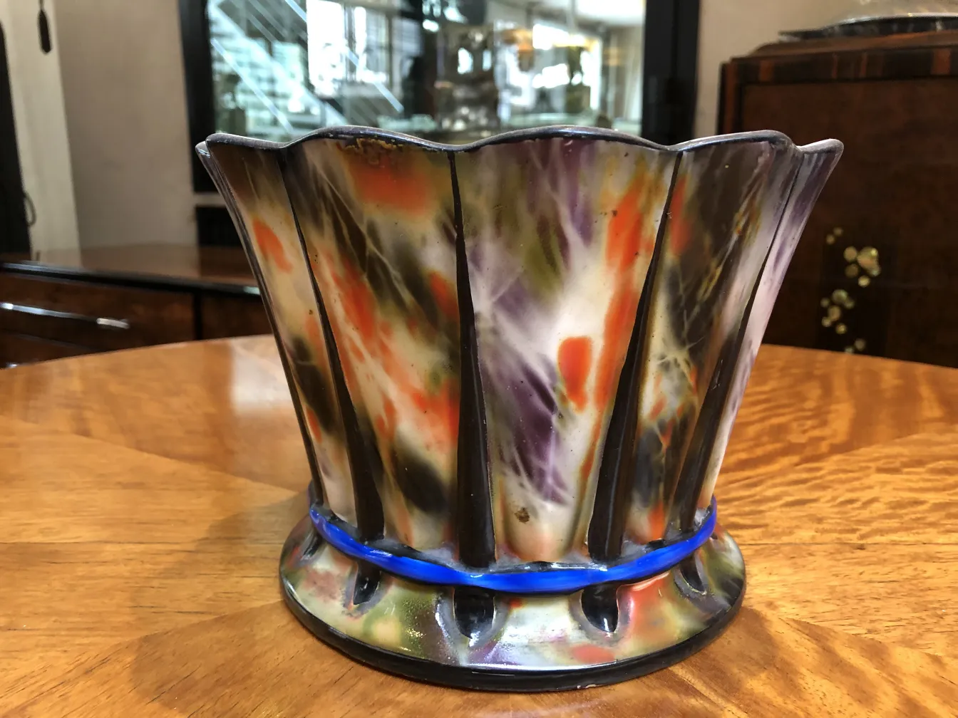 Beautiful antique ceramic with vibrant colors in decorative shape