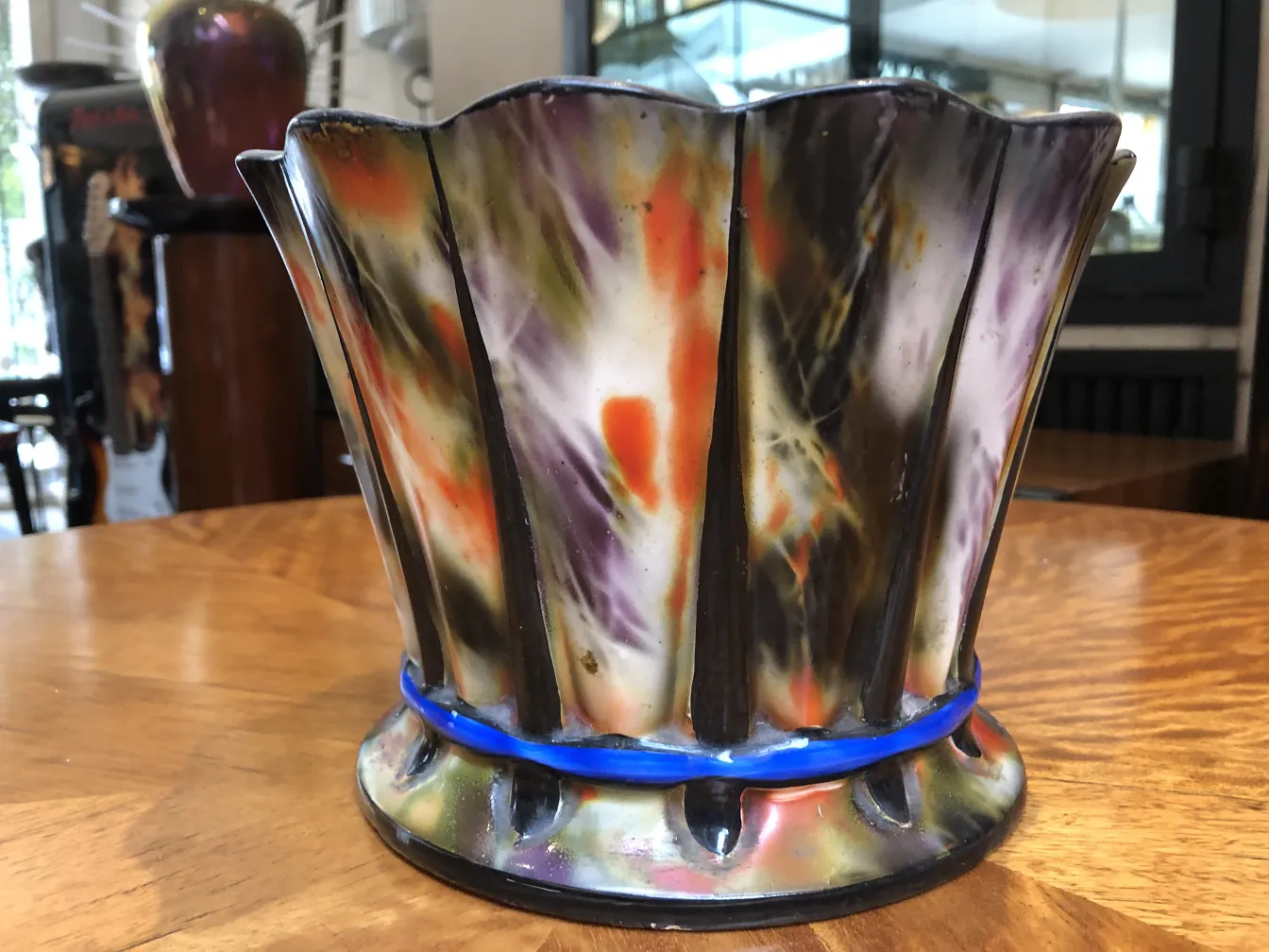 Colorful antique ceramic with a beautiful floral design. Perfect for decorative use.