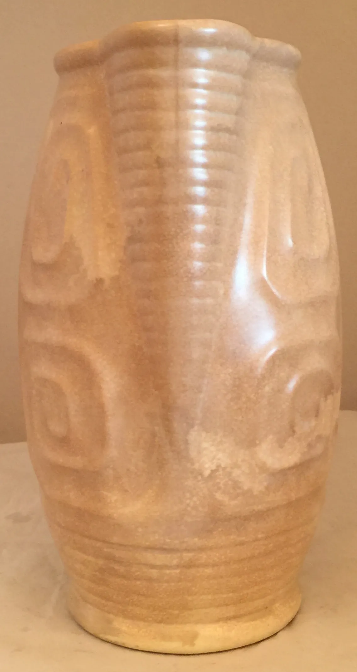 Antique ceramic vase with embossed design