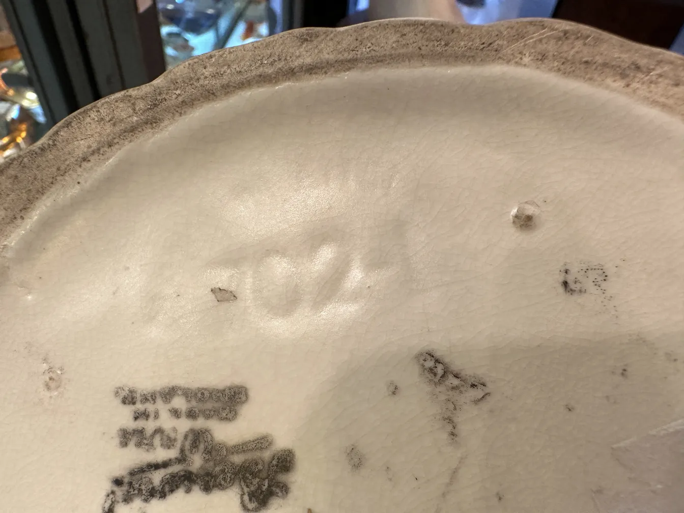 Antique ceramic with visible details and markings