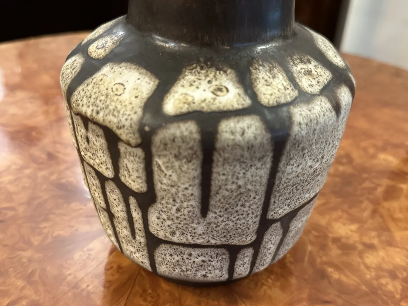 Antique ceramic vase with light decorative texture