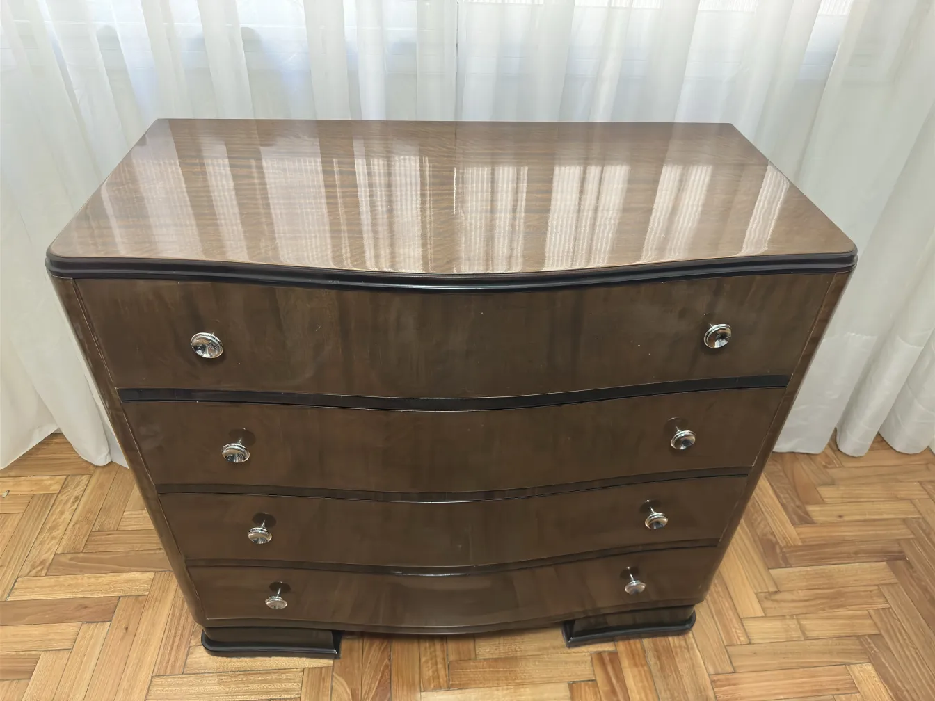 Antique wooden cabinet with a shiny and elegant surface