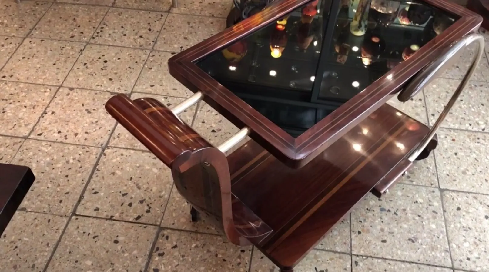 antique wooden cocktail trolley with glass surface