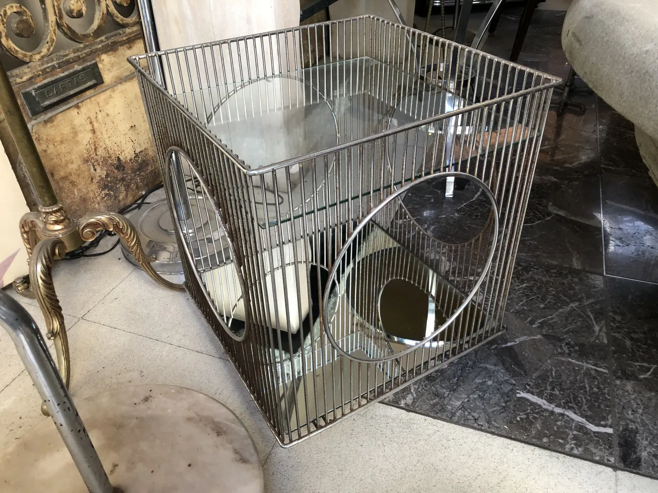 antique cocktail trolley by Warren Platner with mirrors and elegant design in a vintage setting.