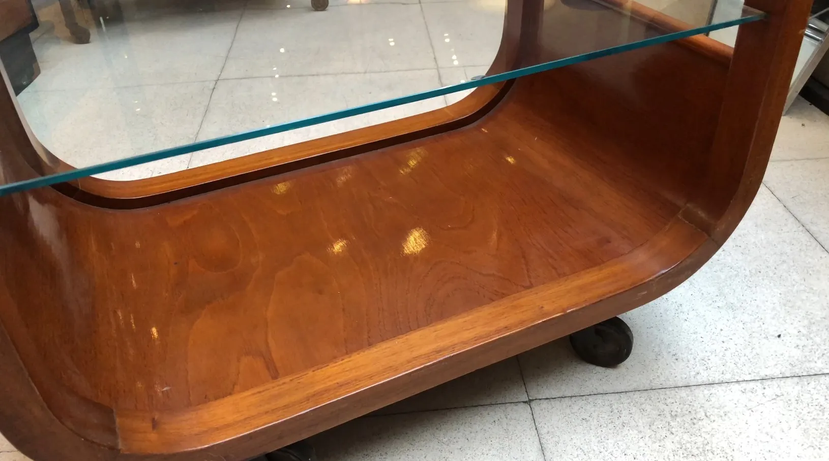 Antique wooden cocktail trolley with glass top