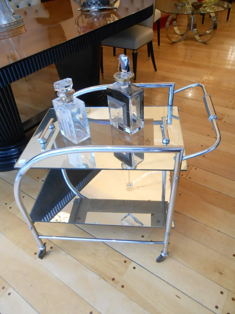 Antique cocktail trolley with decorative bottles