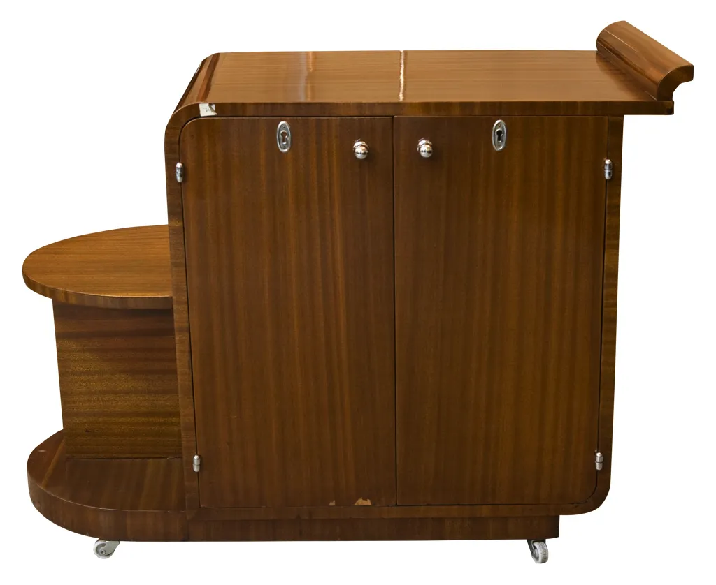 Antique cocktail trolley featuring cabinets and elegant wheels