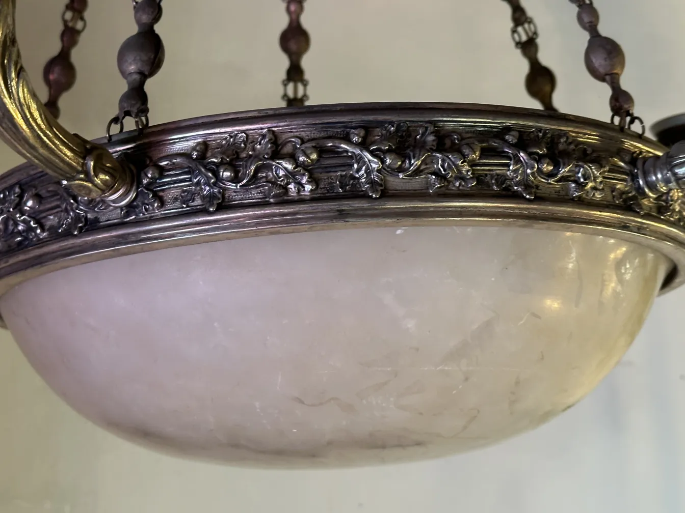 Antique hanging lamp with decorative metal details