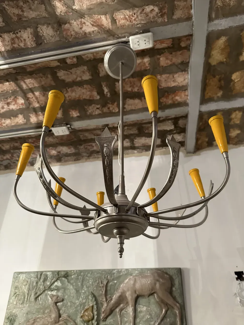 Antique hanging lamp with curved arms and yellow details