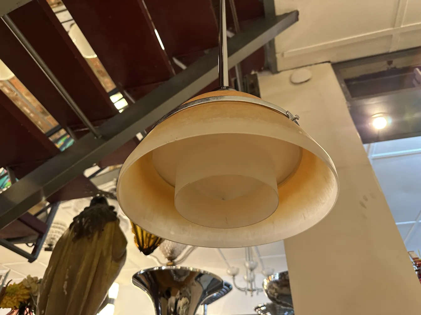 antique hanging lamp with elegant design, cozy ambiance, Peter Behrens