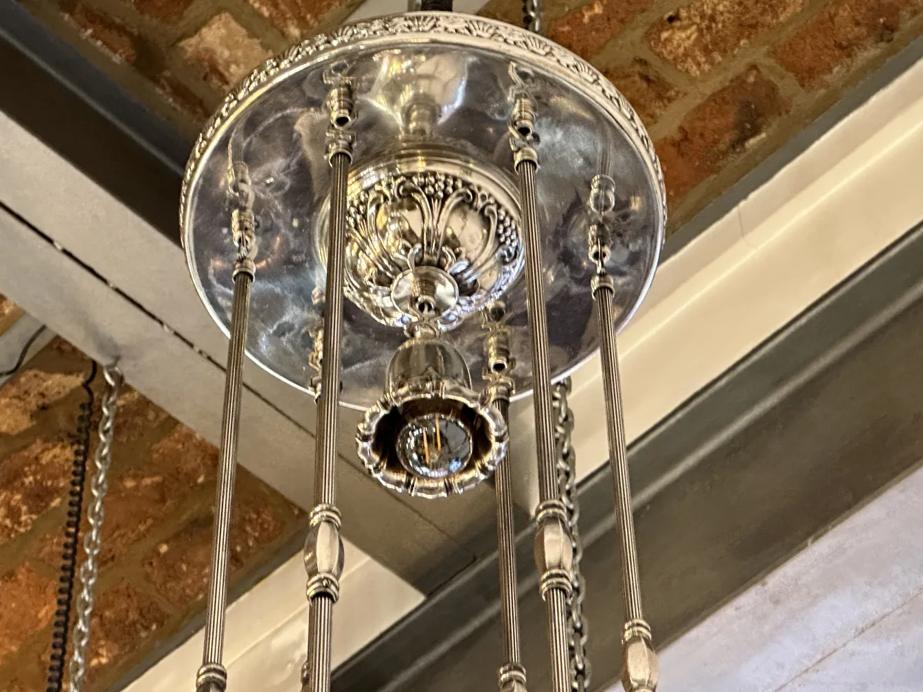 Bright antique hanging lamp with ornamental details