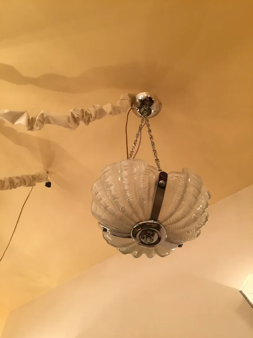 Antique hanging lamp with glass design and warm ambiance