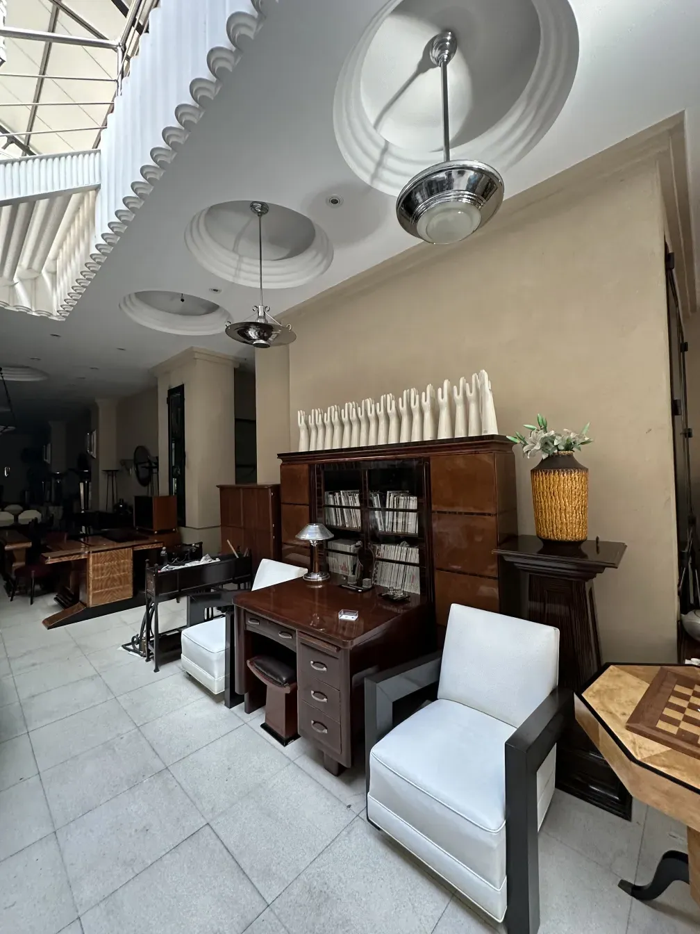 Antique hanging lamp with elegant design in a modern room.