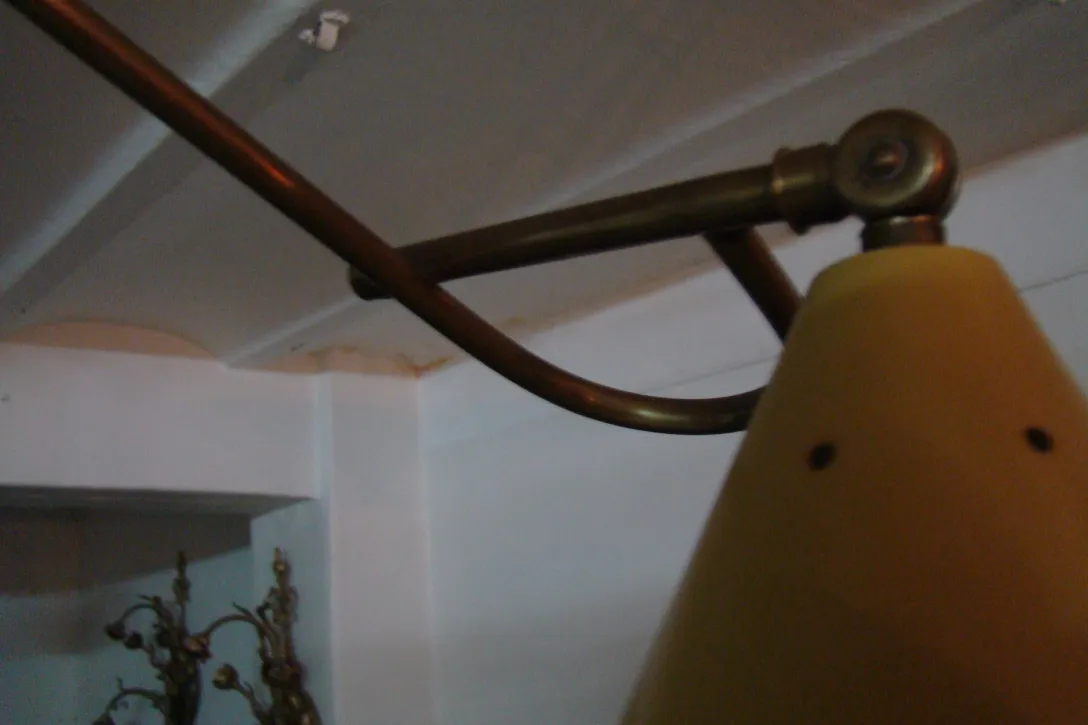 Antique hanging lamp designed by Boris Lacroix in a retro setting.