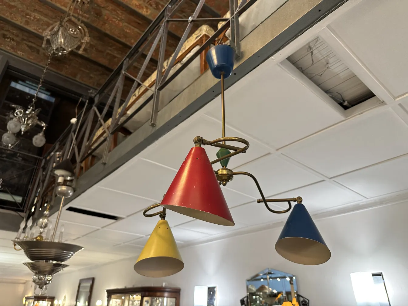 Antique hanging lamp with colorful shades, cozy atmosphere.