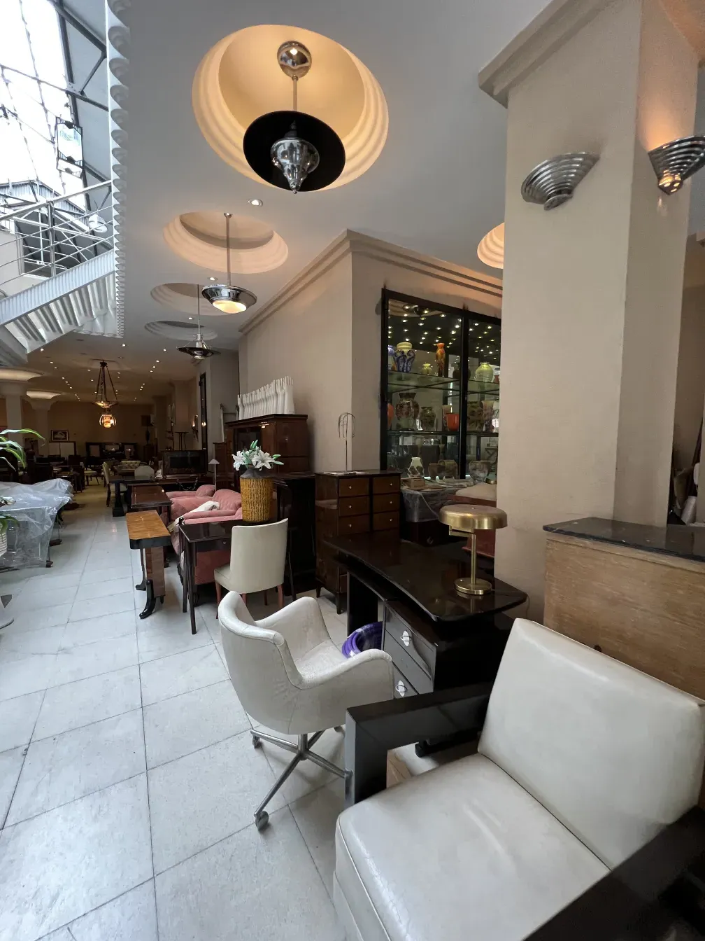 Antique hanging lamp in an elegant setting with vintage furniture