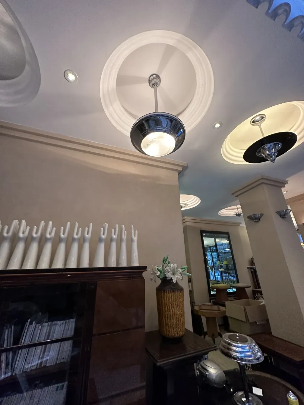 Antique hanging lamp with soft light, elegant design, cozy environment.