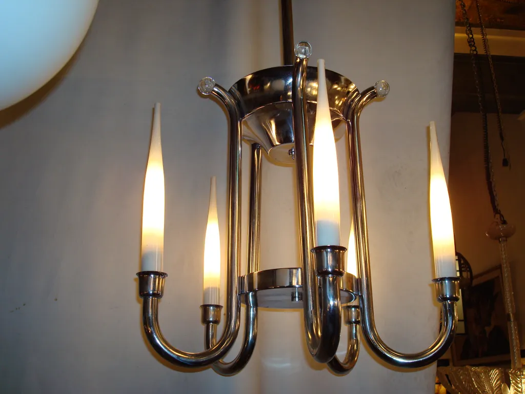 Antique hanging lamp with elegant design in a cozy setting.