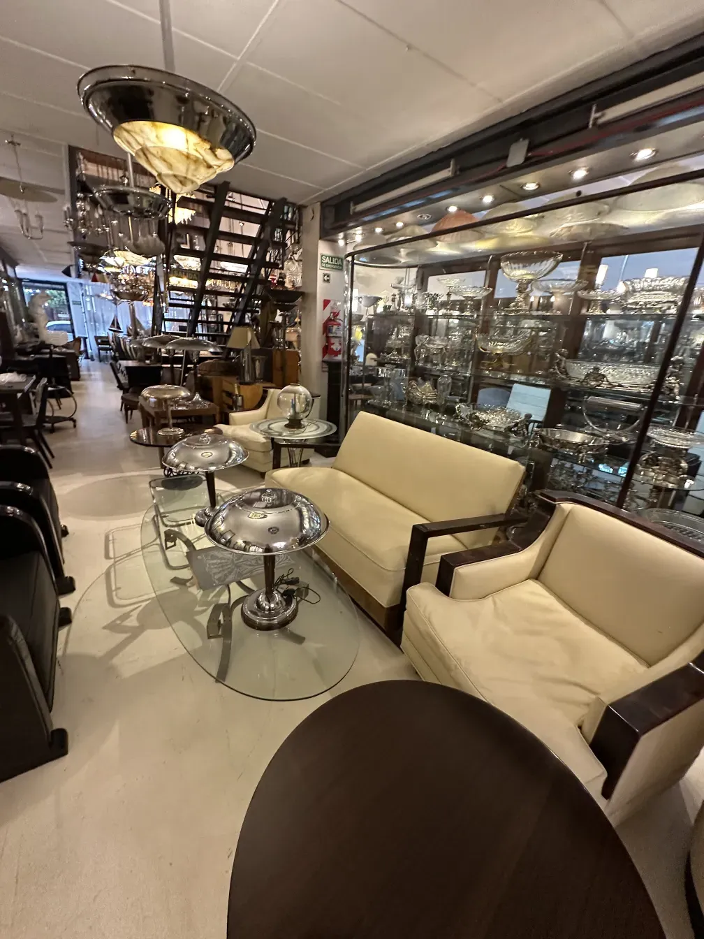 elegant antique hanging lamp in a cozy setting with sofas