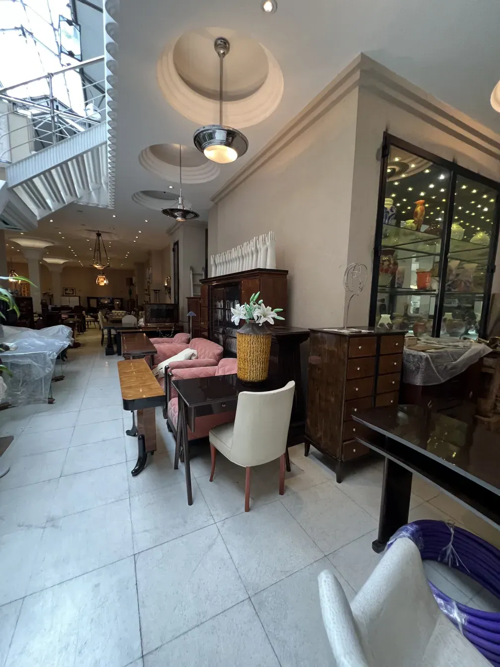 antique hanging lamp with round design illuminating a cozy space