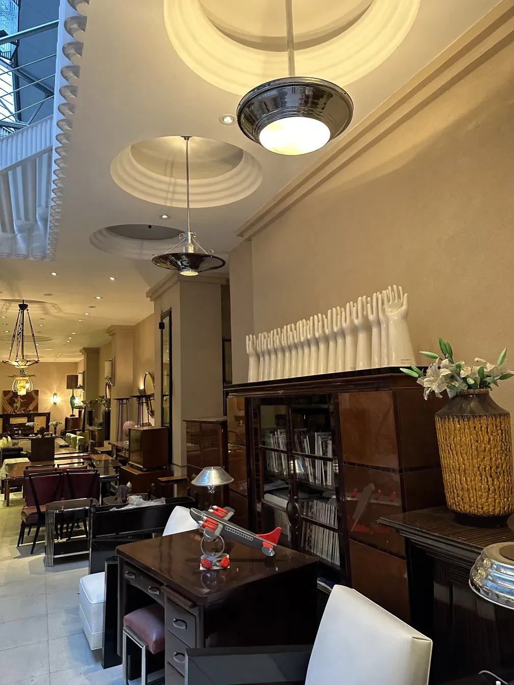 Antique hanging lamp with elegant design in a modern setting.